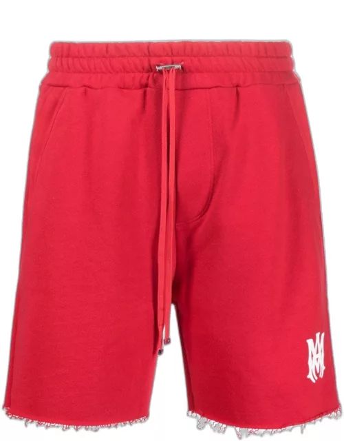 Red sports shorts with logo