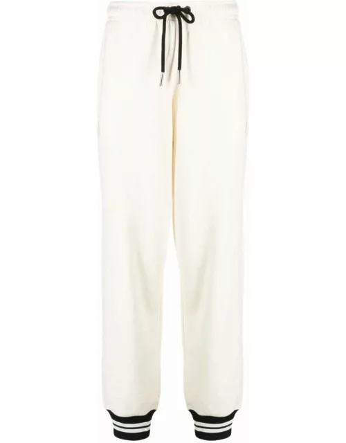 White sport pants with stripe