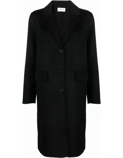 Black single-breasted coat with peaked lapel