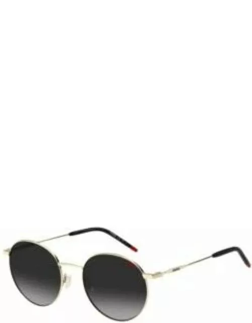 Gold-tone sunglasses with black details Women's Eyewear