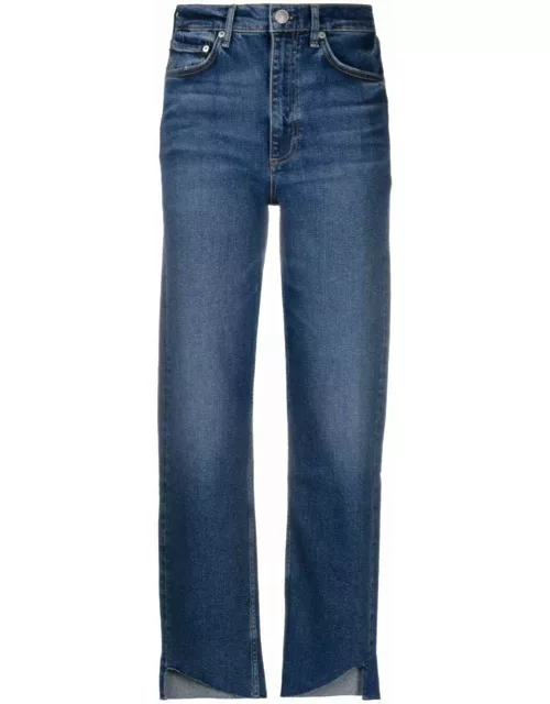 Straight blue jeans with asymmetrical hemline