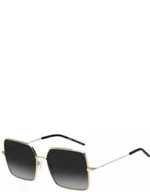 Gold-tone sunglasses with black end-tips Women's Eyewear