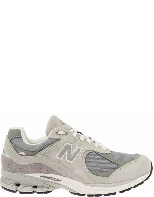 New Balance 2002r Grey Low Top Sneakers With Logo Patch In Suede Leather Man