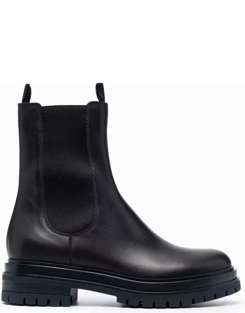 Black ankle boots with elastic side panel