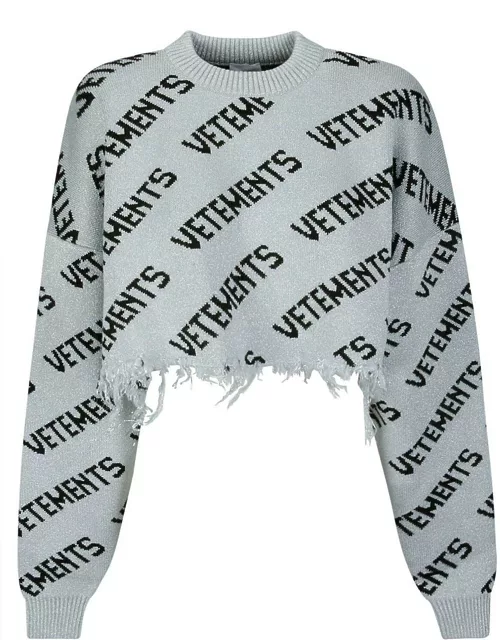 VETEMENTS All-over Logo Printed Cropped Sweater