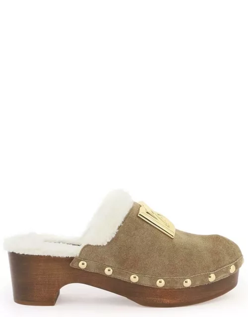 DOLCE & GABBANA suede and faux fur clogs with dg logo.