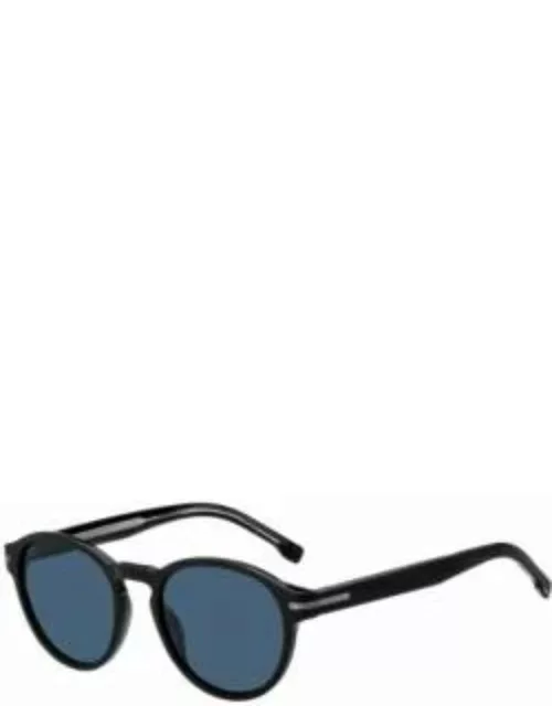 Round sunglasses in black acetate with blue lenses Men's Eyewear