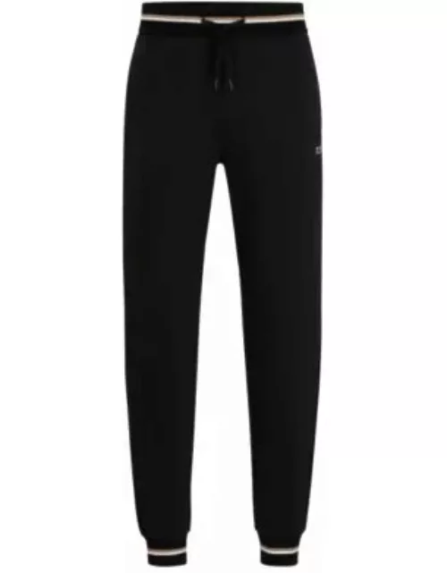 Cotton-terry tracksuit bottoms with logo in signature colors- Black Men's Loungewear