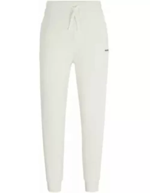 Cotton-terry tracksuit bottoms with logo print- White Men's Jogging Pant