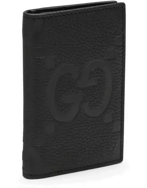 Black vertical wallet in Jumbo GG