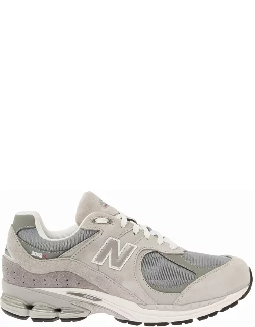 New Balance 2002r Grey Low Top Sneakers With Logo Patch In Suede Leather Man