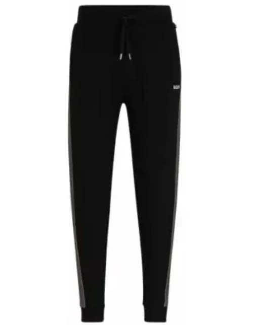 Tracksuit bottoms with embroidered logo- Black Men's Loungewear
