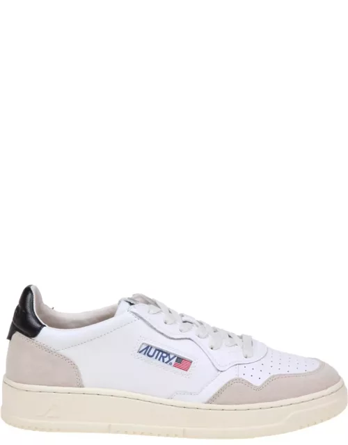 Autry Sneakers In Black And White Leather And Suede