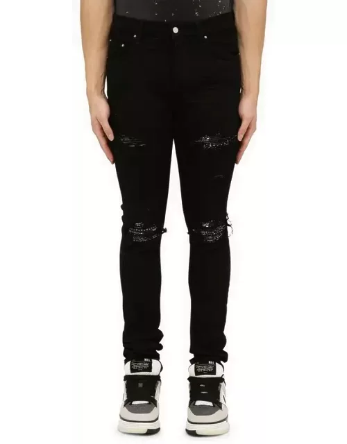 Black skinny jeans with camouflage patche