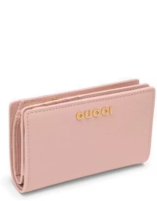 Pink leather wallet with zip and logo