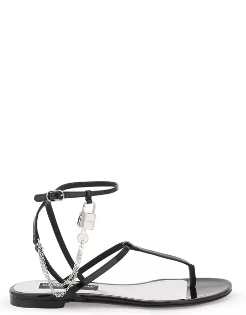 DOLCE & GABBANA patent leather thong sandals with padlock
