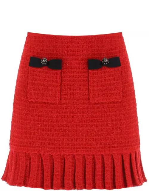 SELF PORTRAIT knitted mini skirt with diamanté button