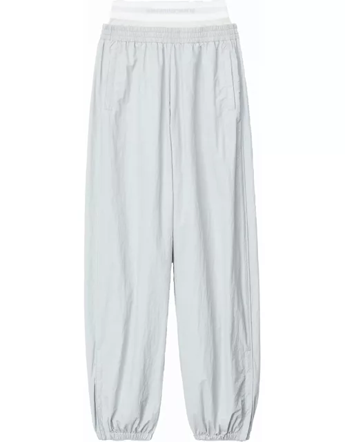 Track pants with prestyled underwear