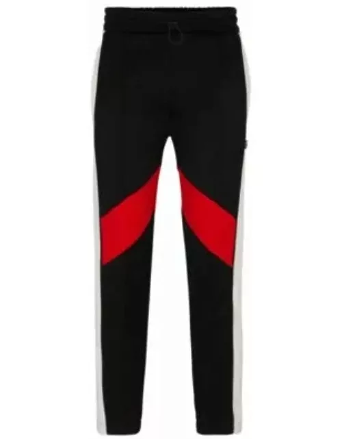 Relaxed-fit tracksuit bottoms with color-blocking- Black Men's Jogging Pant