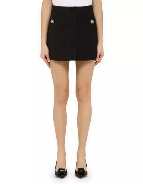 Black wool mini skirt with jewelled button