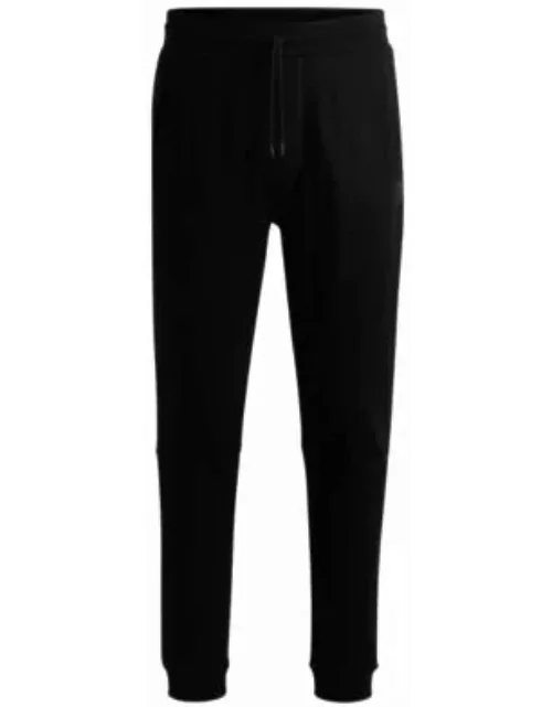 Cotton-terry tracksuit bottoms with logo patch- Black Men's Jogging Pant
