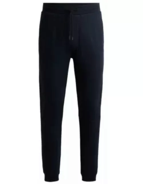 Cotton-terry tracksuit bottoms with logo patch- Dark Blue Men's Jogging Pant