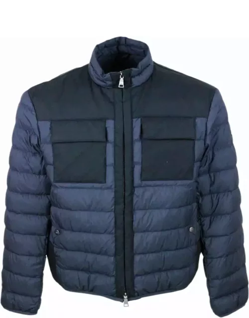 Add 100 Gram Down Jacket With High Quality Feathers. Technical Fabric Details And Chest Pockets. The Closure Is With Zip