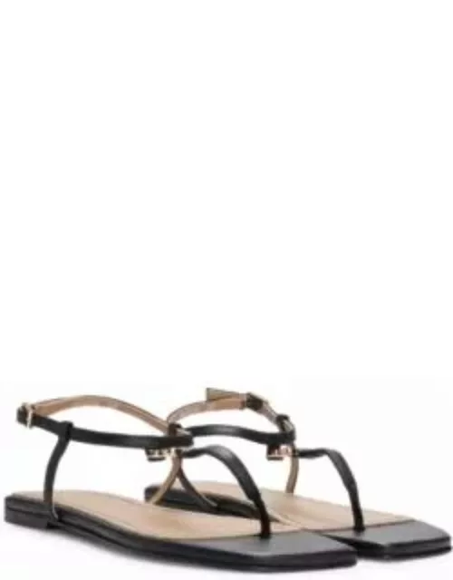 Leather sandals with toe-post detail- Black Women's Sandal