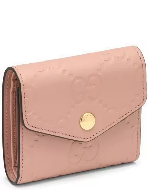 Tri-fold pink leather wallet