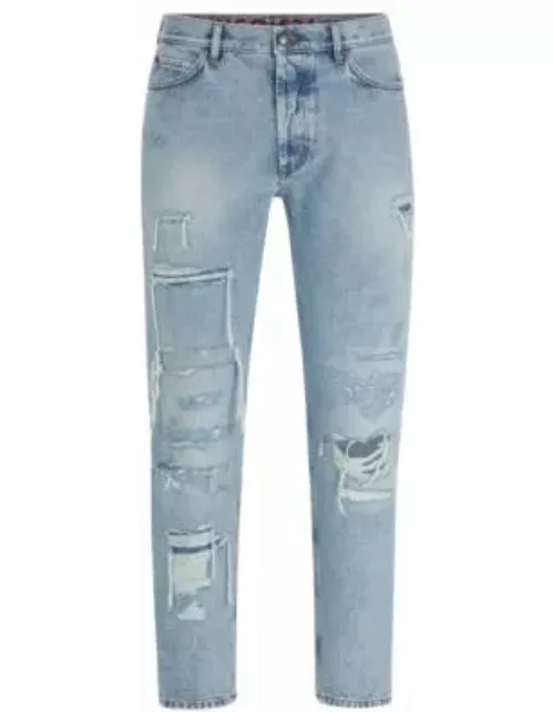 Tapered-fit jeans in blue denim with destroyed details- Light Blue Men's Jean