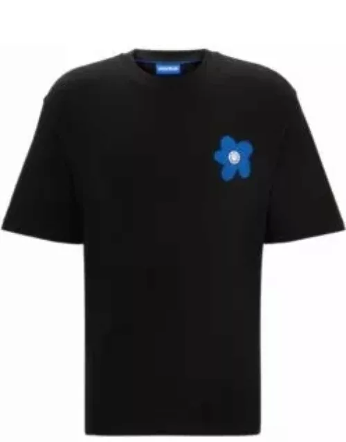 Cotton-jersey T-shirt with flower logo artwork- Black Men's T-Shirt